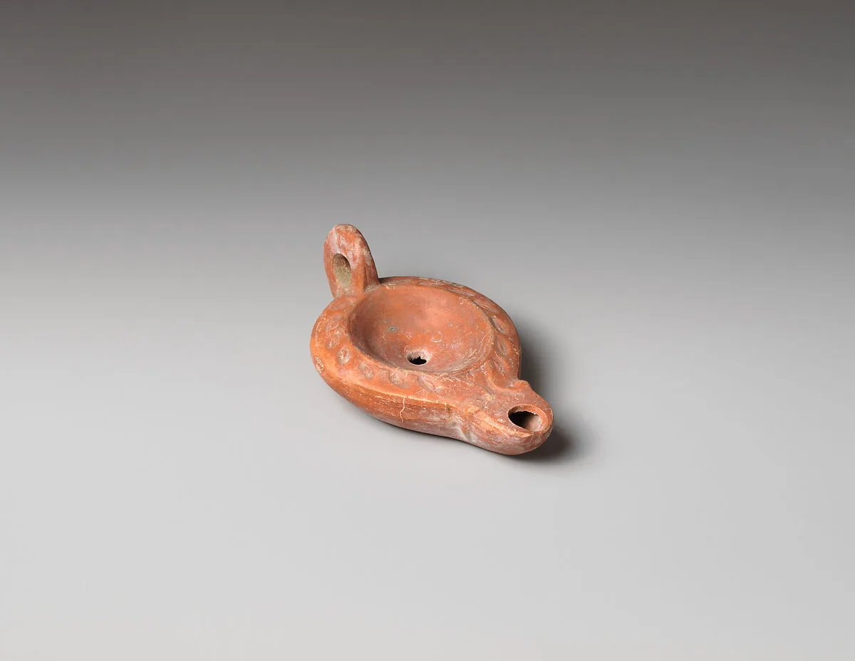 Terracotta oil lamp — Unknown