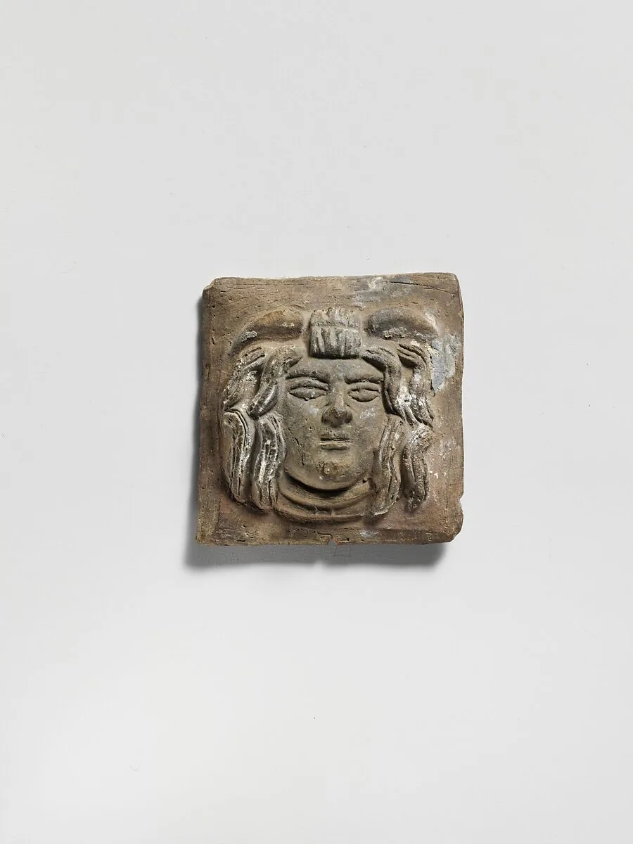 Terracotta relief plaque with head of Medusa — Unknown