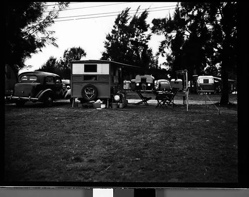 [Trailer with Canopy and Chairs in Camp, Florida]