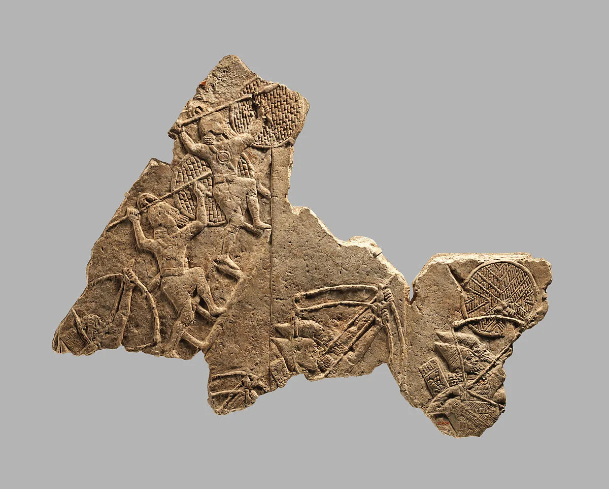 Relief fragment: siege of a city by Assyrian troops — Unknown