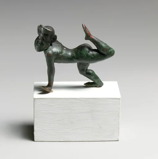 Bronze statuette of a satyr dancing
