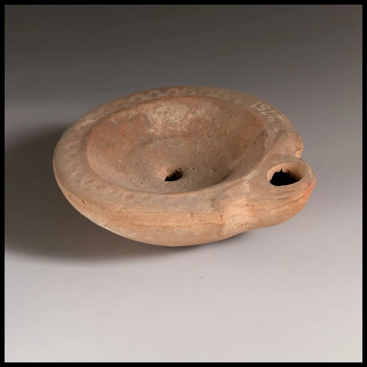Terracotta oil lamp — Unknown