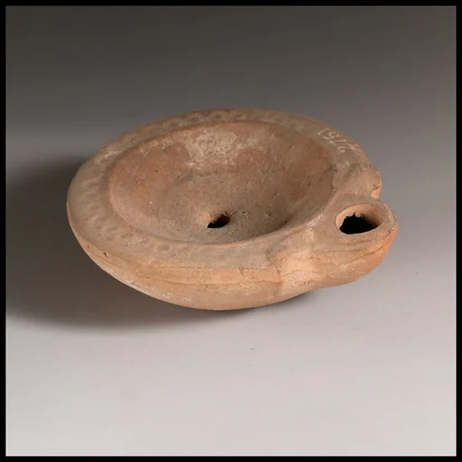 Terracotta oil lamp