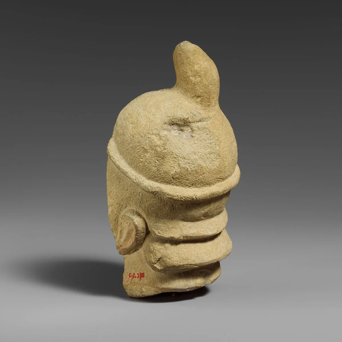 Fragment of a limestone head of the “Triple Geryon” (?) — Unknown