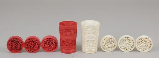 Draughtsmen (34) and cups (2)