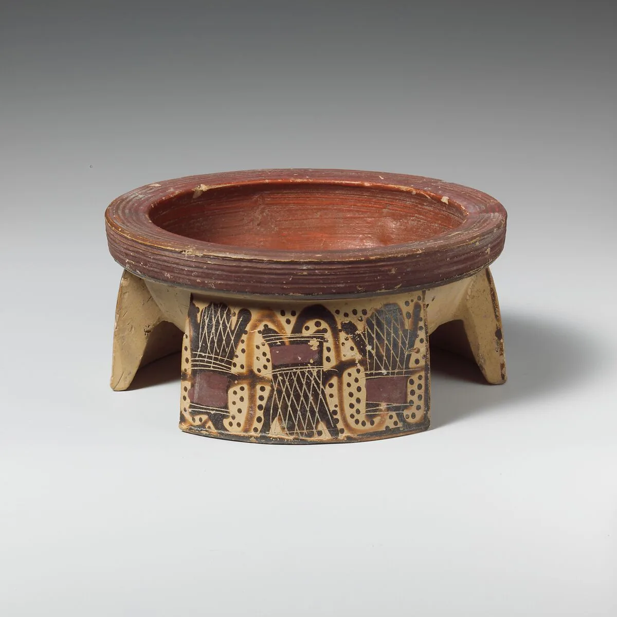 Terracotta tripod pyxis (box) — Unknown