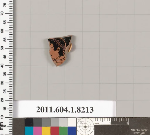 Terracotta fragment of a kylix (drinking cup)