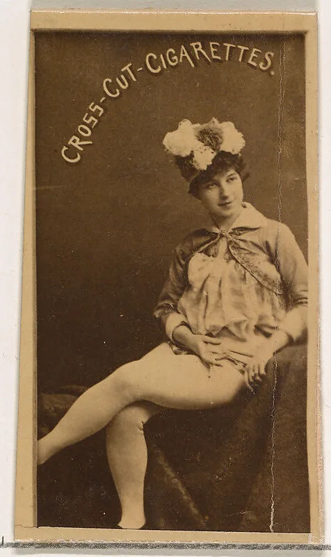 Seated actress wearing tights and feathered hat, from the Actors and Actresses series (N145-1) issued by Duke Sons & Co. to promote Cross Cut Cigarettes — W. Duke, Sons & Co.