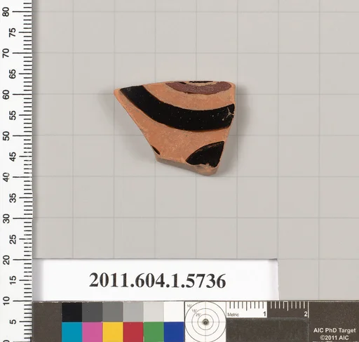 Terracotta fragment of a kylix: eye-cup (drinking cup)