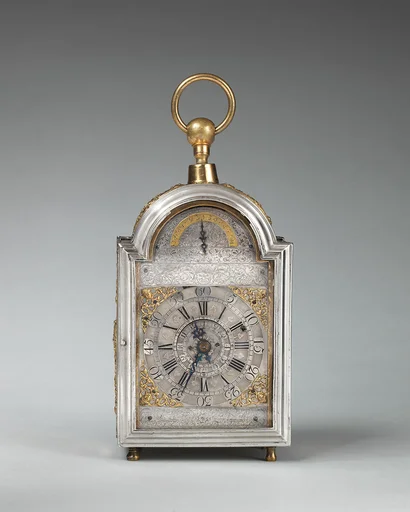 Traveling clock with alarm and calendar