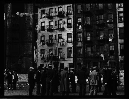 [Crowd of Men in Front of Tenement Building, New York City]