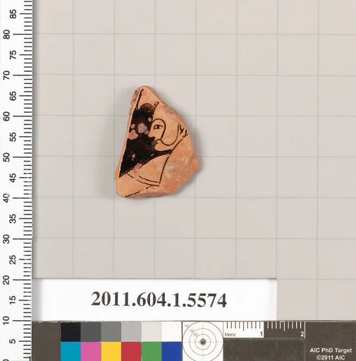Terracotta fragment of a kylix (drinking cup)