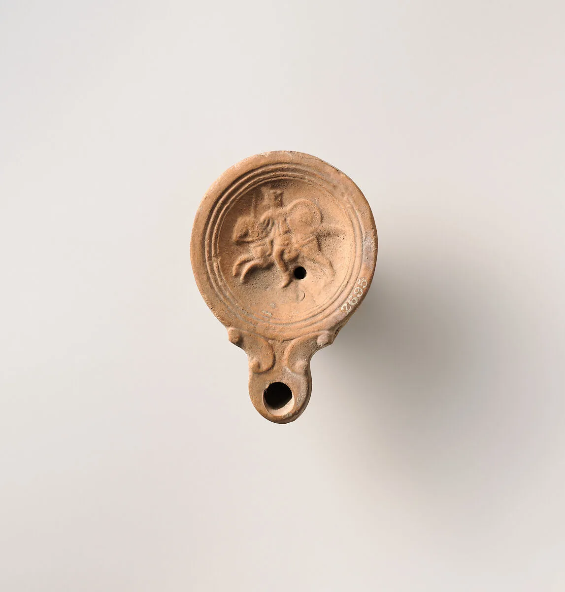 Terracotta oil lamp — Unknown