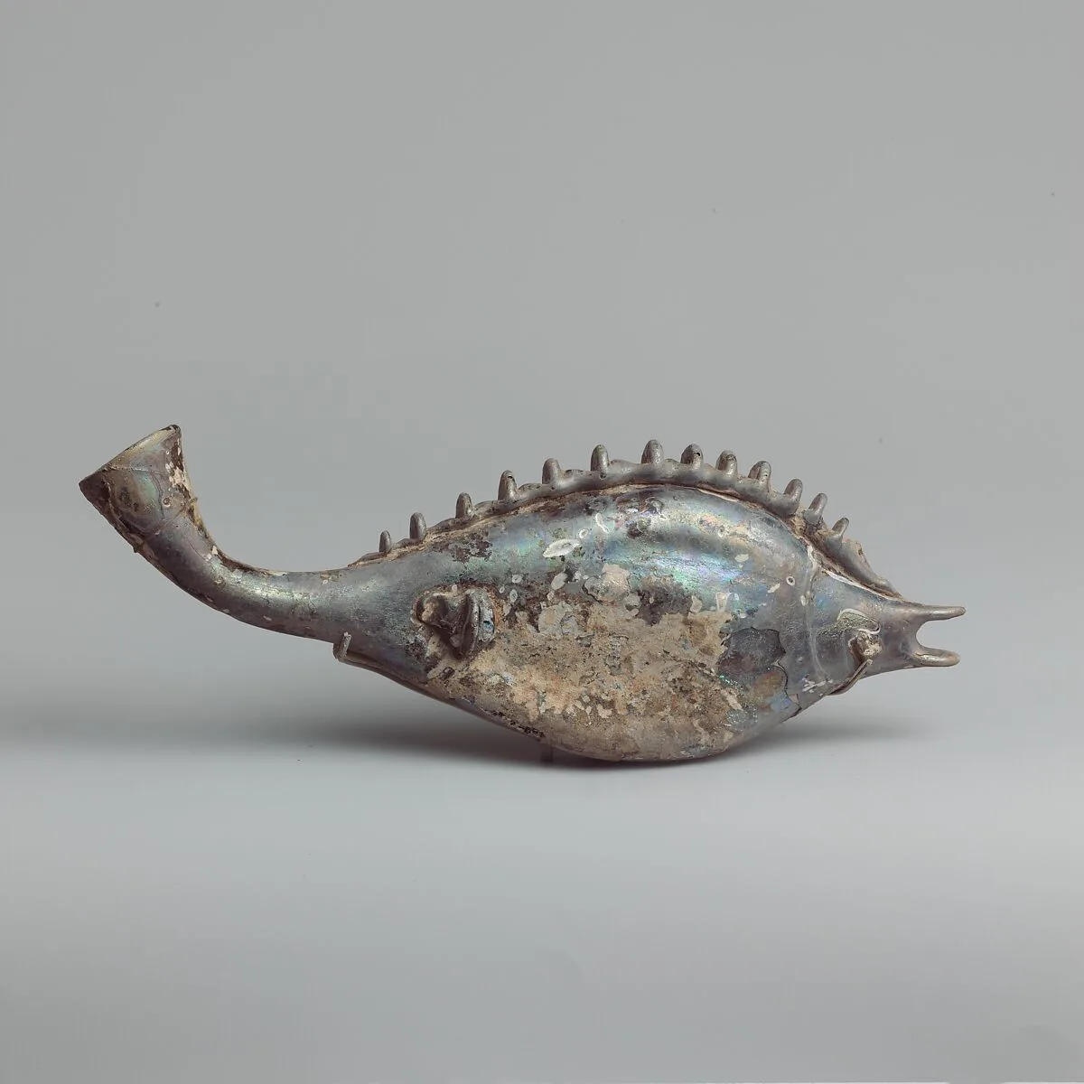 Glass flask in the form of a fish — Unknown