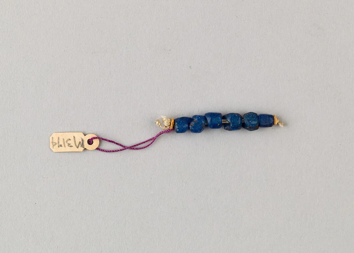 String of 6 beads — Unknown