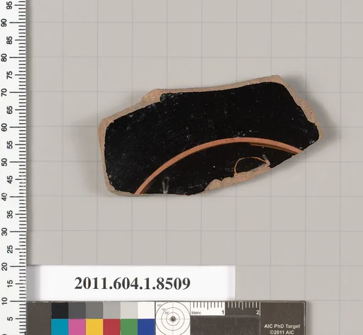 Terracotta fragment of a stemless kylix (drinking cup)