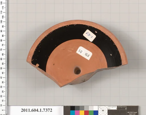 Terracotta fragment of a kylix (drinking cup)