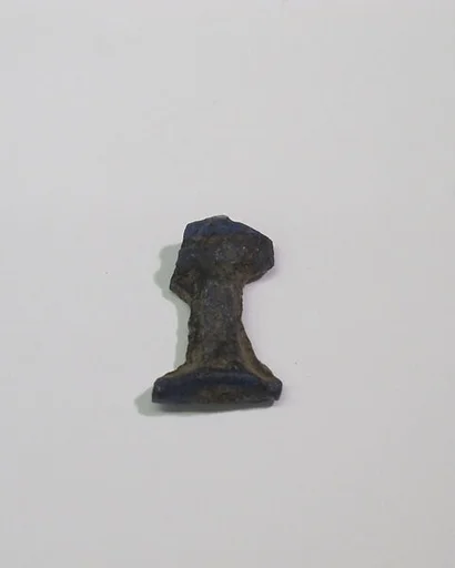 Mold-pressed amulet or fragment
