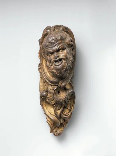 Satyr head harp ornament