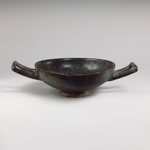 Terracotta stemless kylix (drinking cup)
