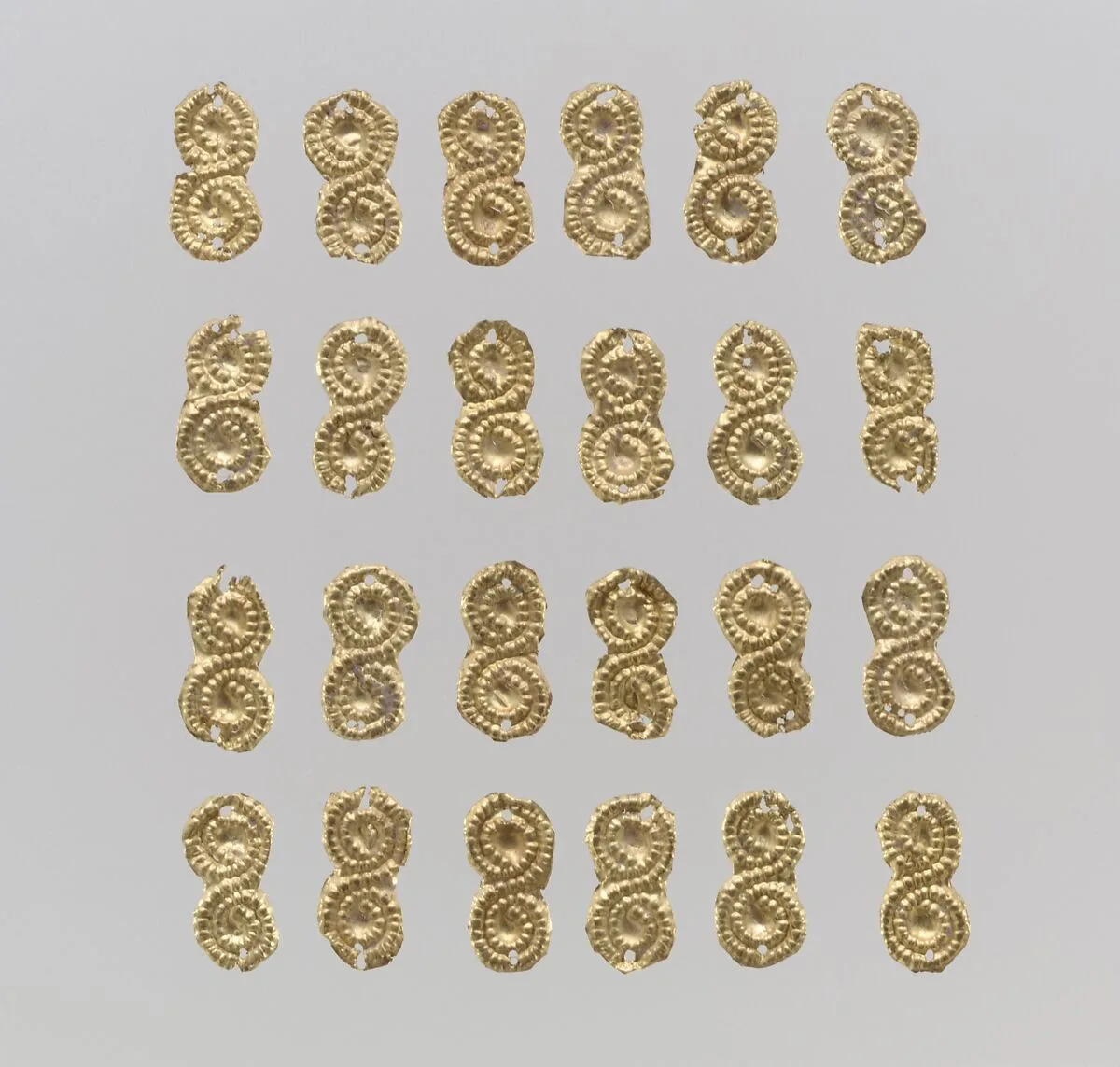 Gold sheet appliques — Unknown