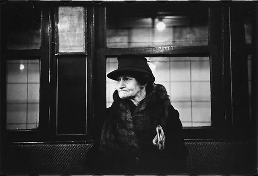 [Five 35mm Film Frames: Subway Passengers, New York City: Man in Hat, Old Woman]