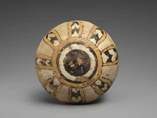 Knob with an eight-petaled rosette