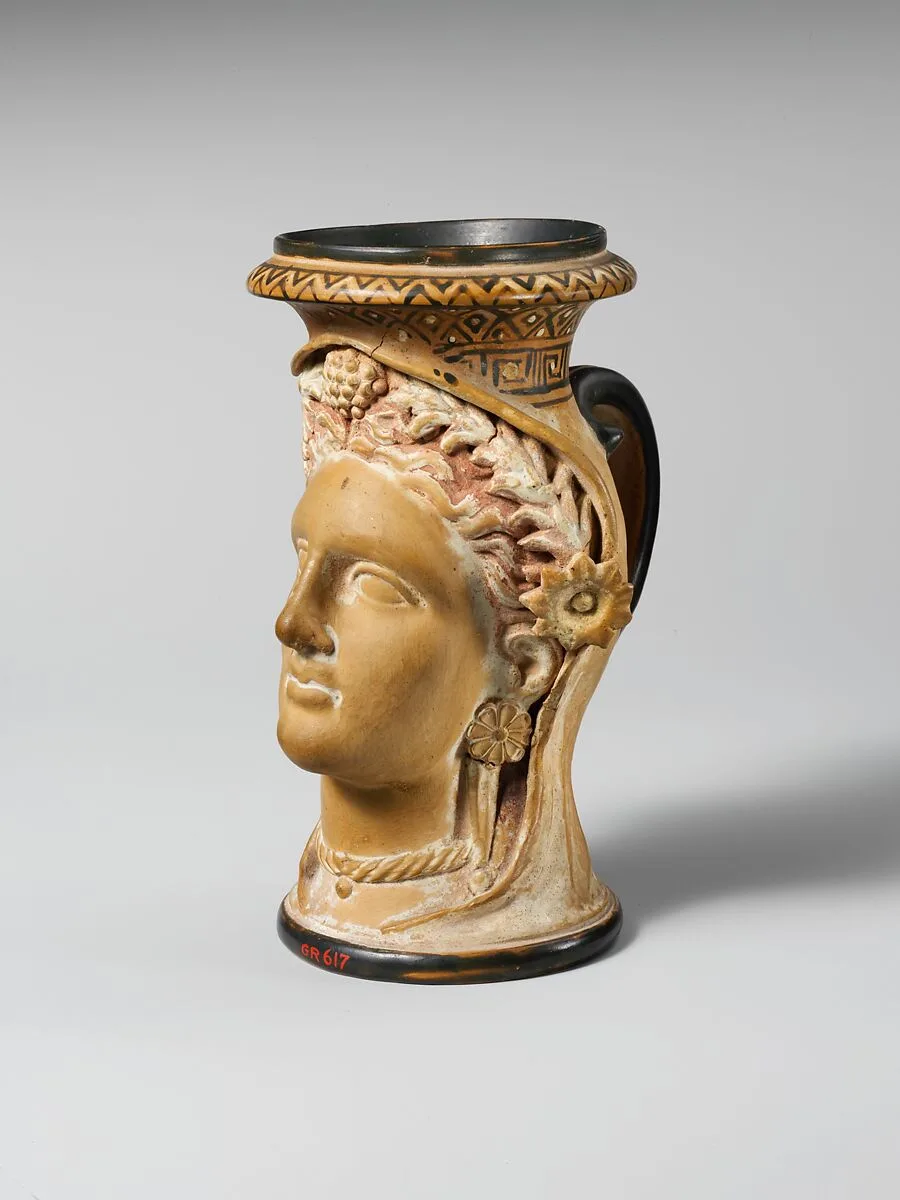 Terracotta oinochoe (jug) in the form of a woman's head — Unknown