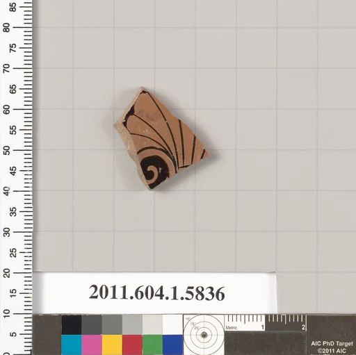 Terracotta fragment of a kylix: eye-cup (drinking cup)