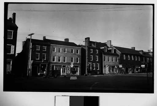 [Main Street Shops and Parked Cars]