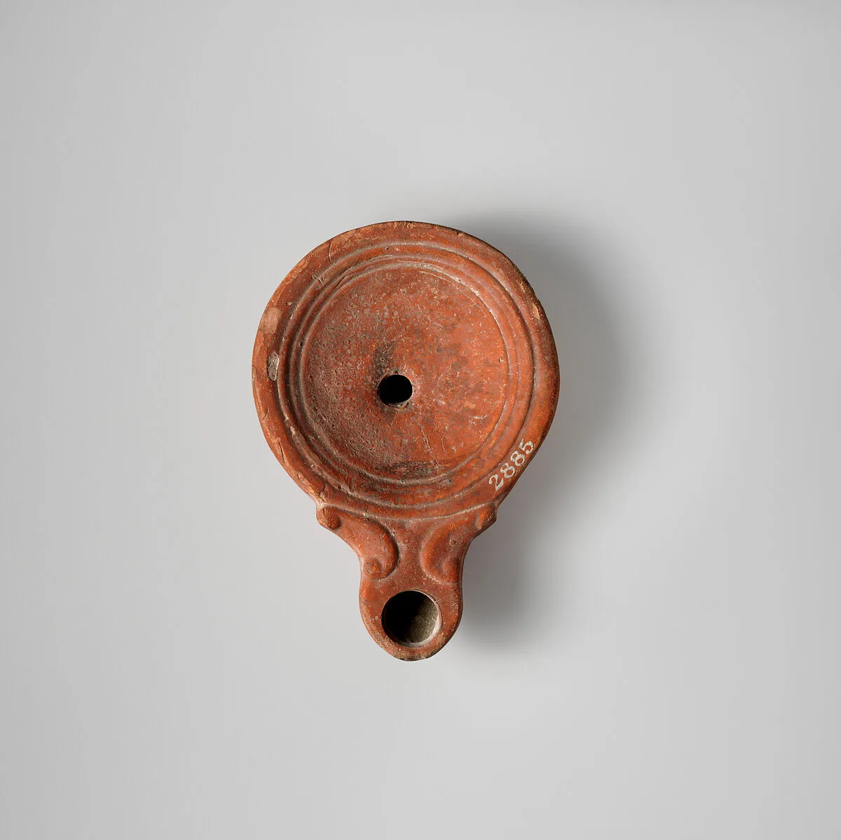 Terracotta oil lamp — Unknown