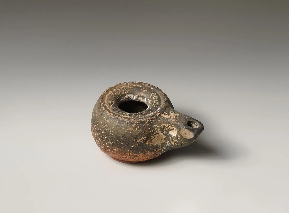 Terracotta oil lamp — Unknown