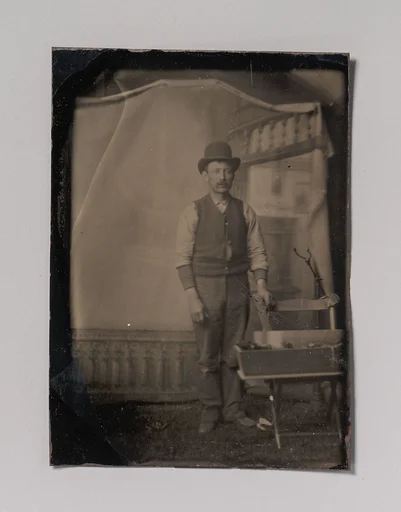[Workman with Tool Box]