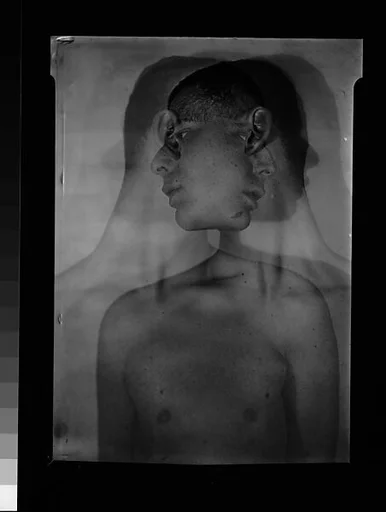 [Double Exposure of Lincoln Kirstein, Left and Right Profiles]