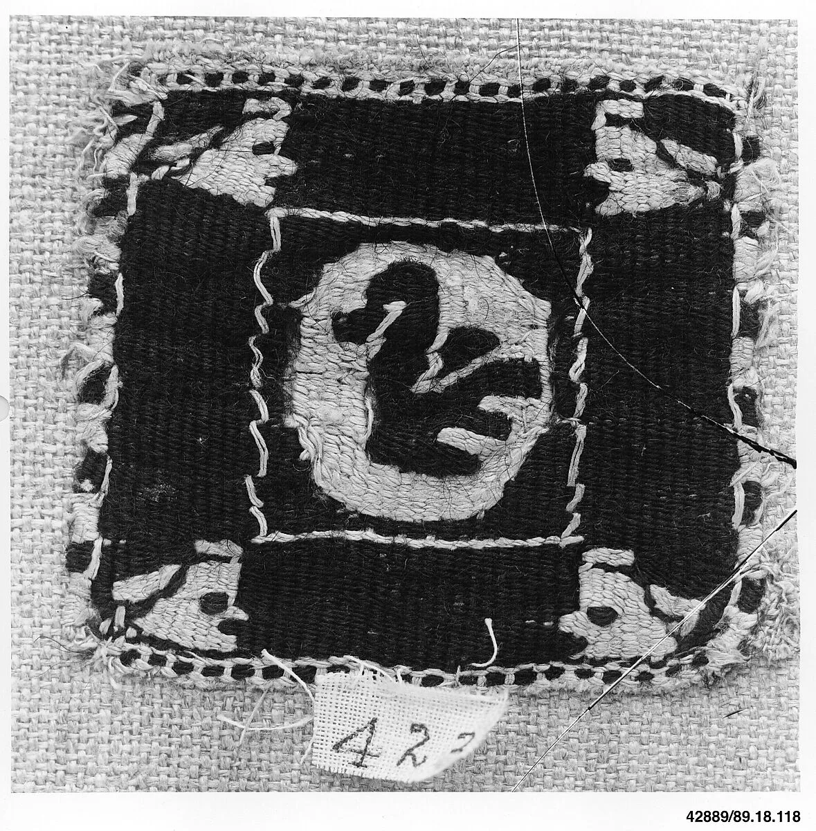Textile Fragment — Unknown