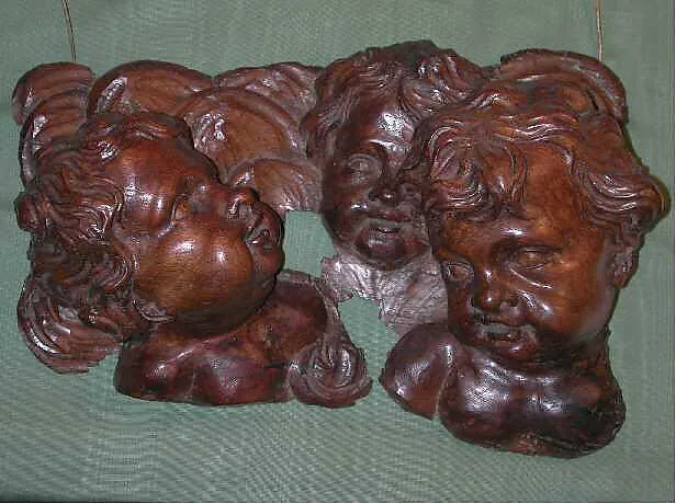 Group of cherub heads — Unknown