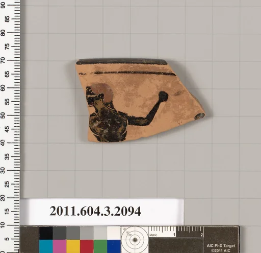 Terracotta rim fragment of a kylix (drinking cup)