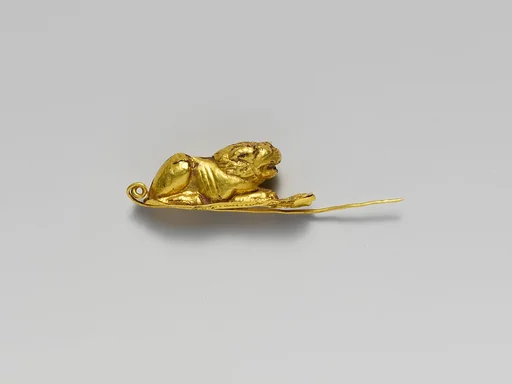 Gold fibula (safety pin) with recumbent lion