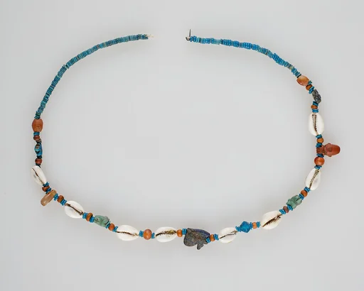 String of beads and amulets (wedjat eyes)