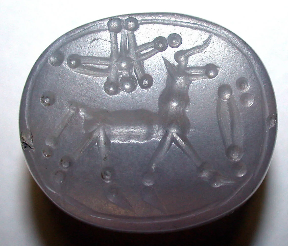 Stamp seal (scaraboid) with animal and divine symbols — Unknown