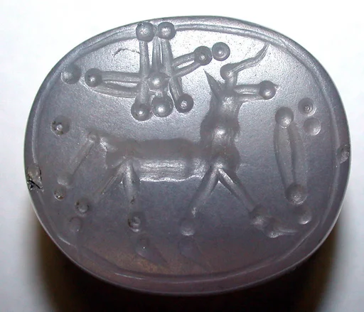 Stamp seal (scaraboid) with animal and divine symbols