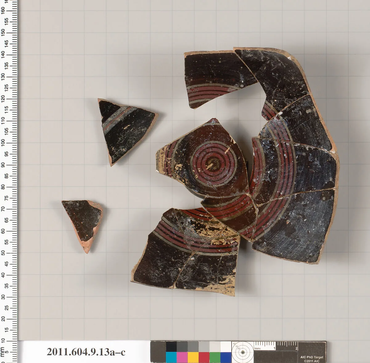 Terracotta fragments of a stemless cup (drinking cup) or a lid — Unknown