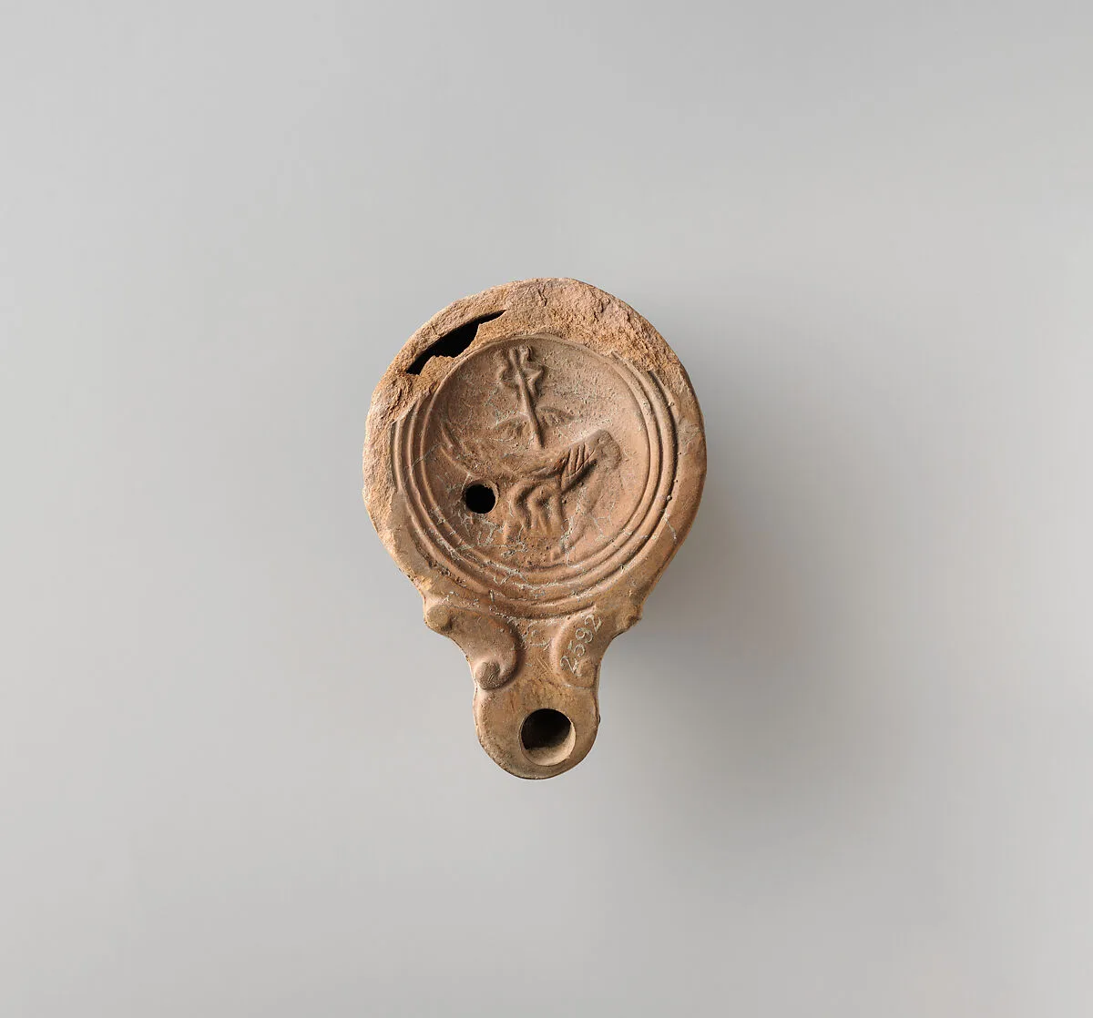 Terracotta oil lamp — Unknown