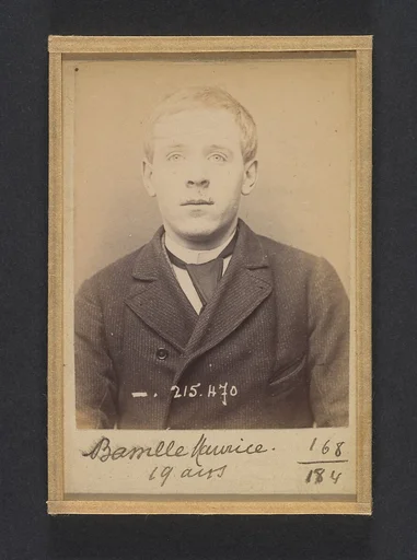Bassille. Maurice, Eugène. 19 ans, né à Paris Ille. Portefeuilliste. Anarchiste. 9/3/94.
