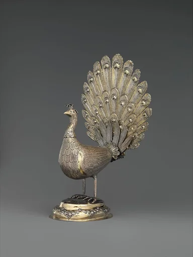 Table decoration in the form of a peacock