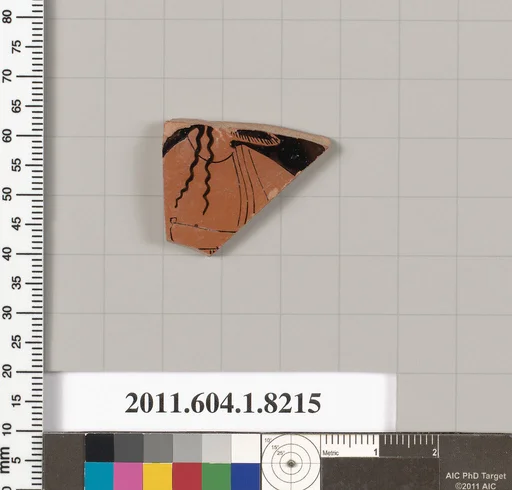 Terracotta fragment of a kylix (drinking cup)