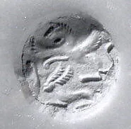 Bell-shaped seal with perforated fist-shaped handle — Unknown