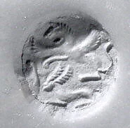 Bell-shaped seal with perforated fist-shaped handle