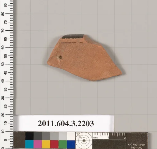 Terracotta rim fragment of a kylix (drinking cup)