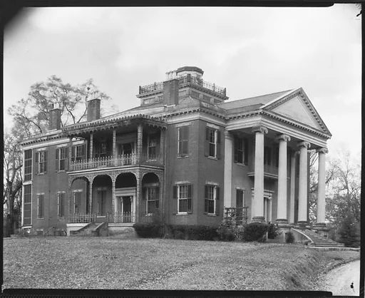 [Oblique View of Brick Greek Revival House with Side Cast Iron Balconies, Natchez, Mississippi?]